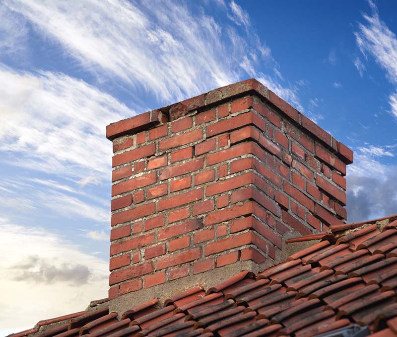 brick chimney in need of repair