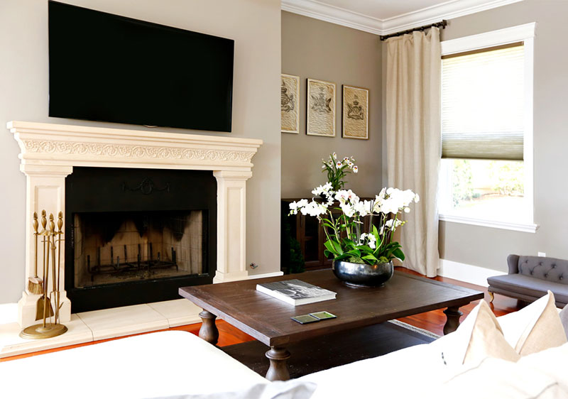 living room fireplace with lots of soot inside